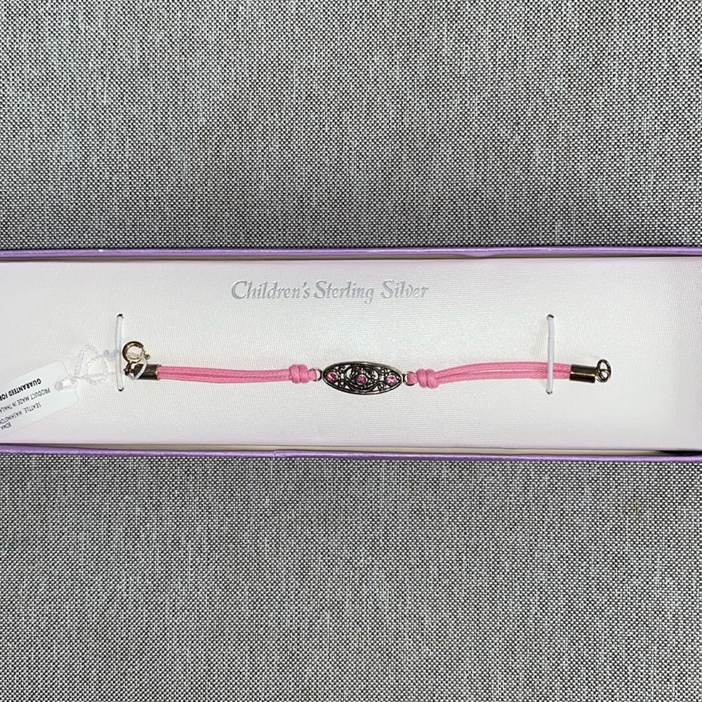 Sterling silver children’s bracelet with pink accents